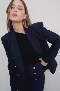 JUPE MIDI À BOUTONS DORÉS