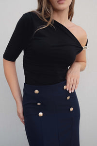 JUPE MIDI À BOUTONS DORÉS