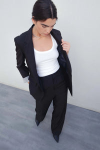 PANTALON LARGE À PLIS